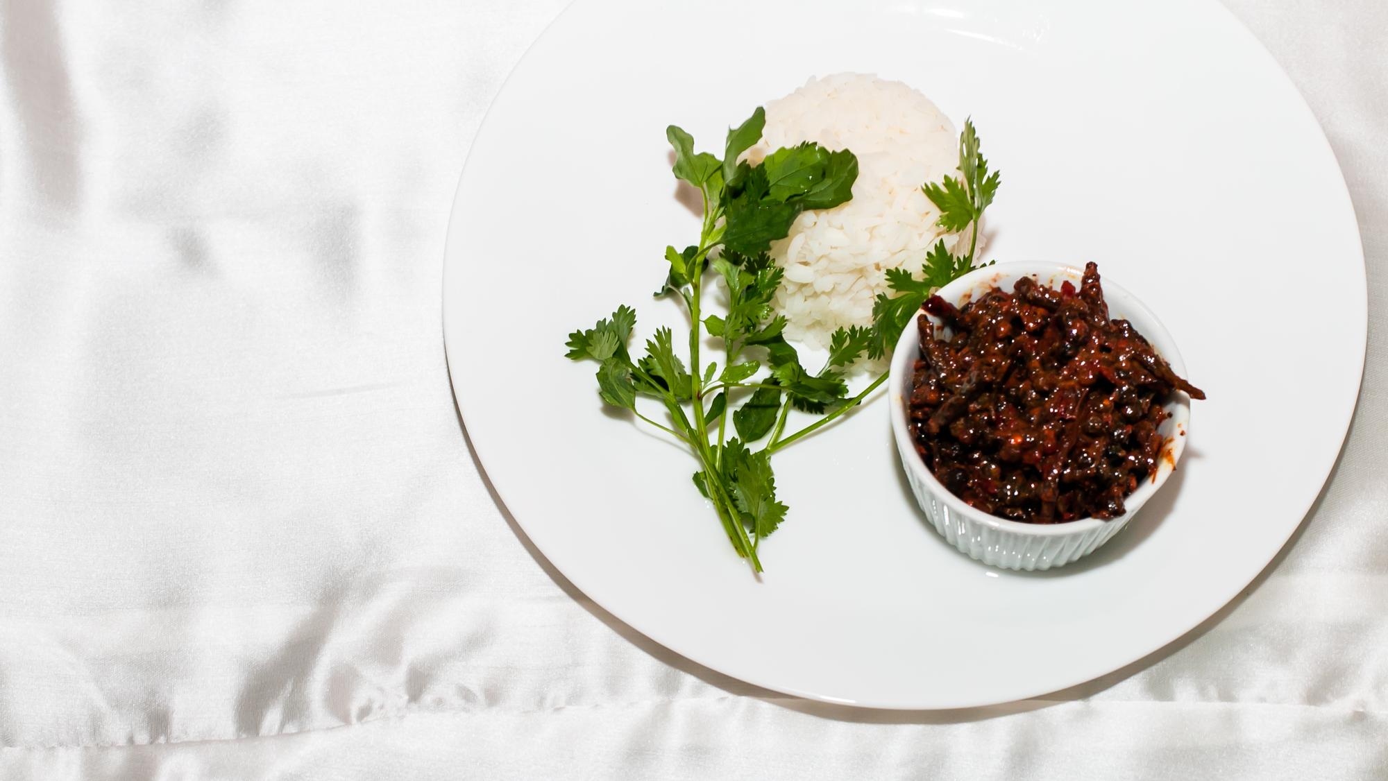 Plated starter with herbs and sauce
