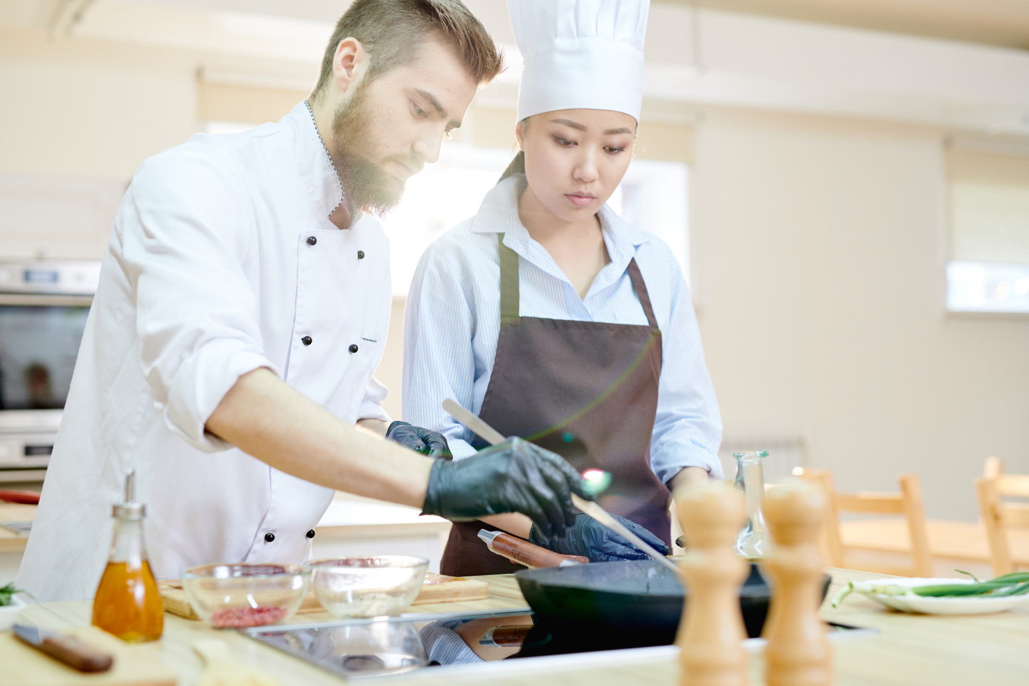 Chef at work in bright test kitchen